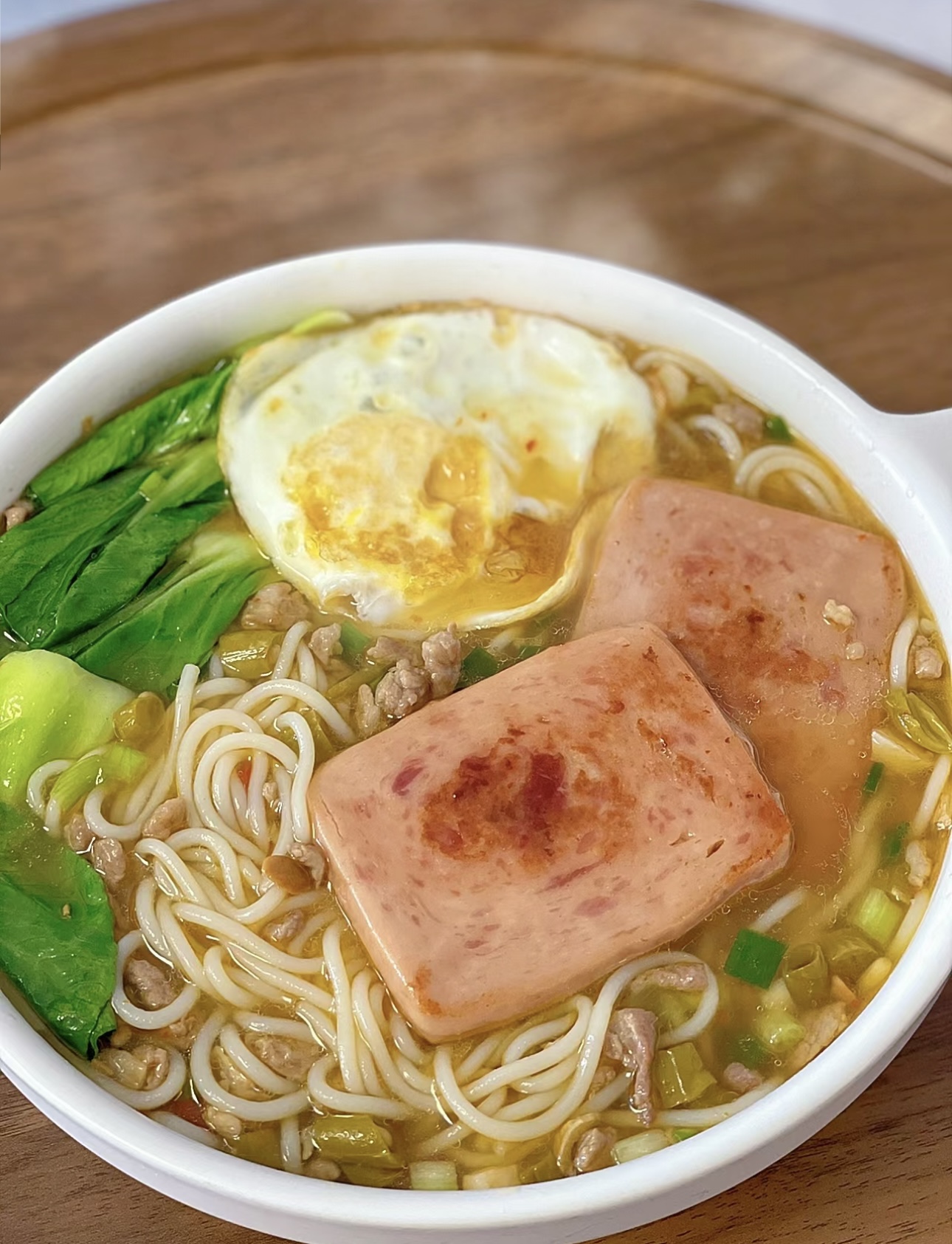 细腻的米粉，在香浓的肉末汤中欢快舞动，每 配图3